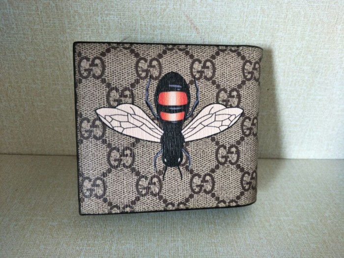 G*u*i  with plaid  bee wallets